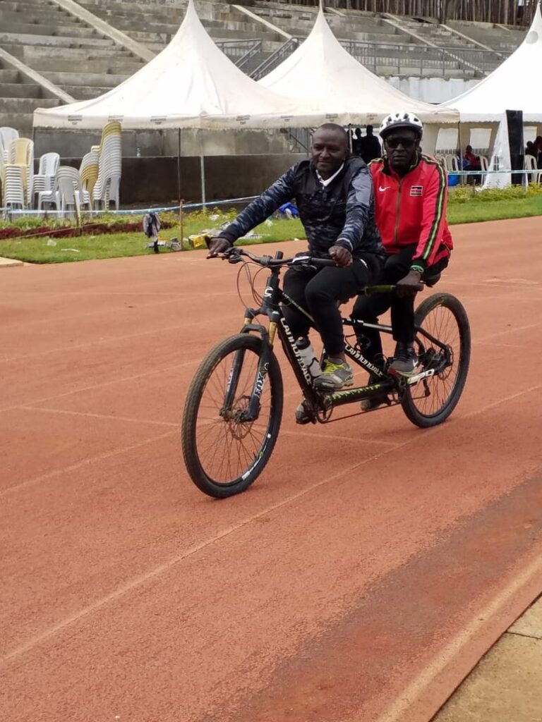 Kennedy Ogada with his pilot Benson Mwaniki in training 